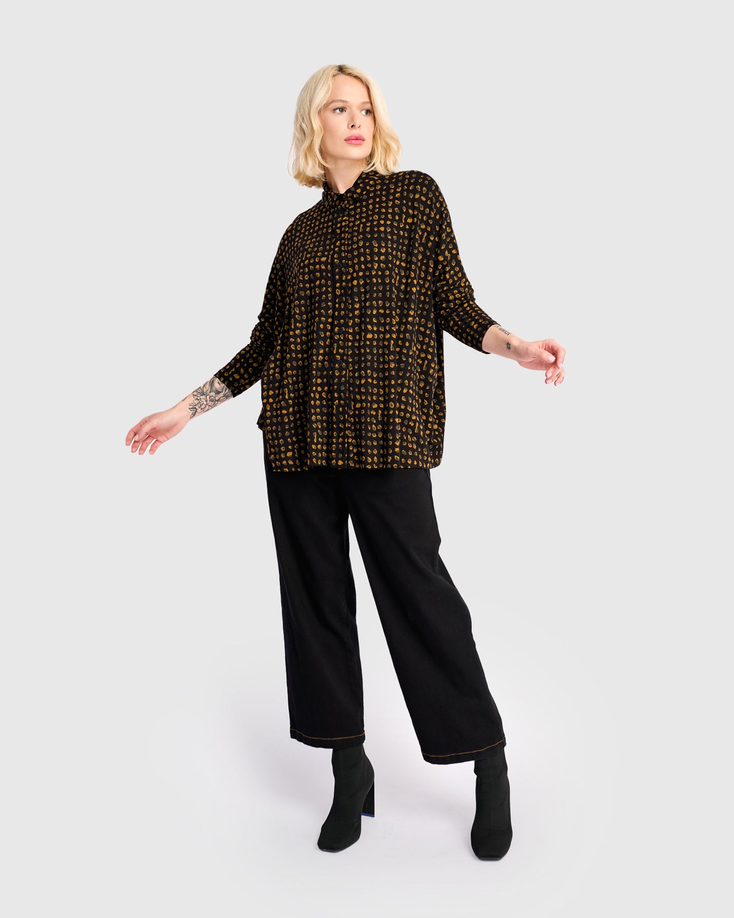 חולצה רינה פולו מנומרת