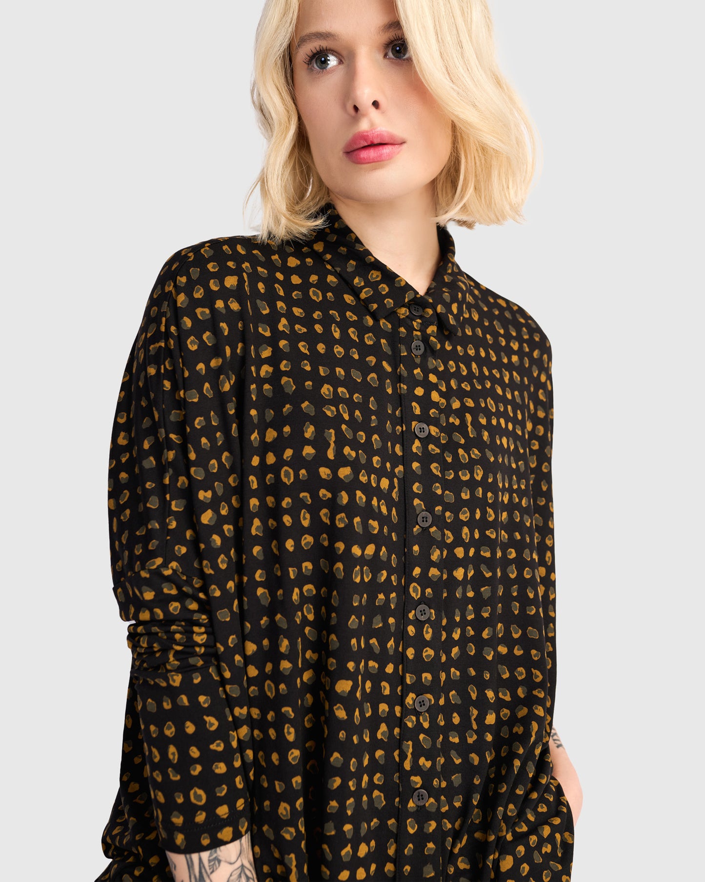 חולצה רינה פולו מנומרת