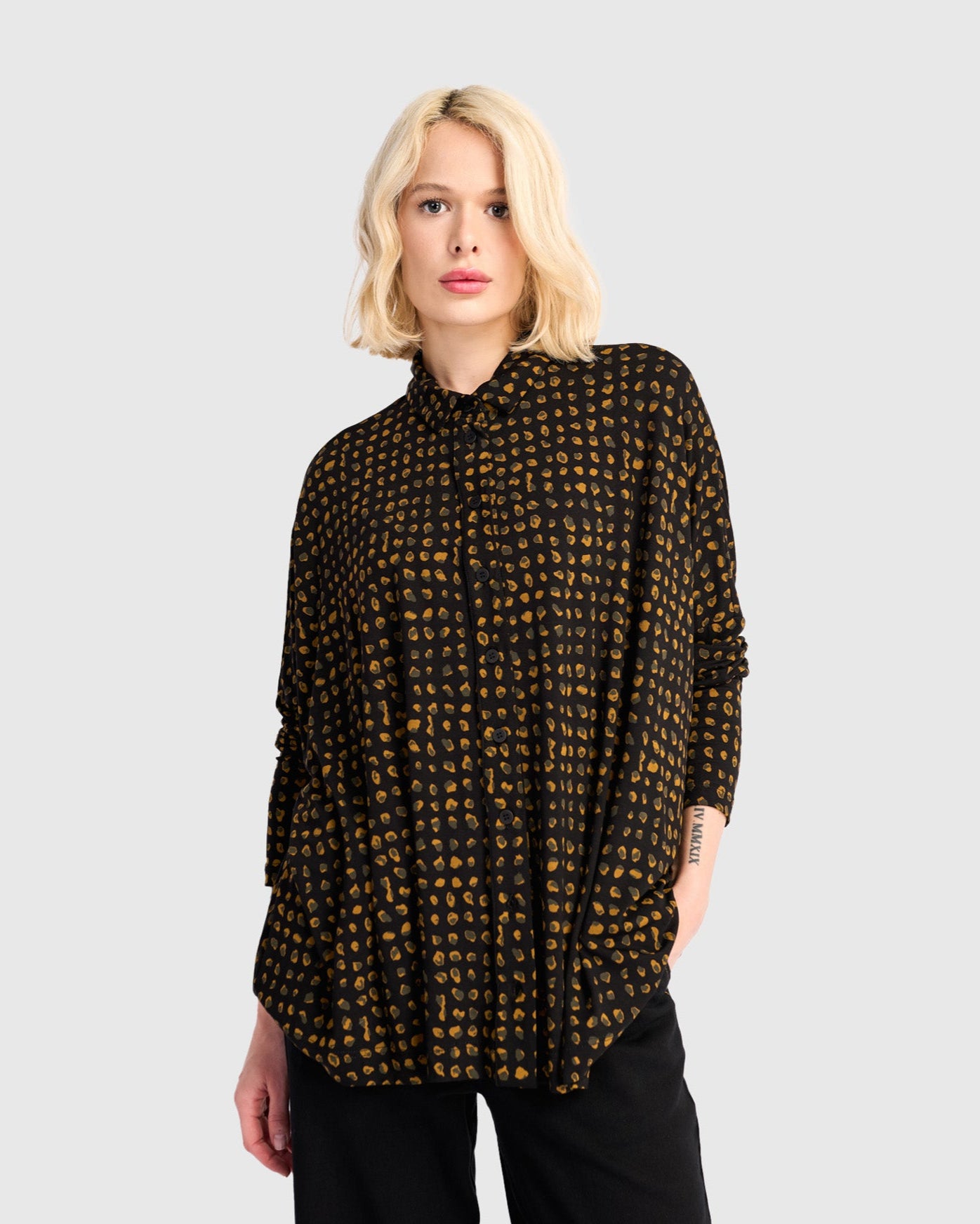 חולצה רינה פולו מנומרת