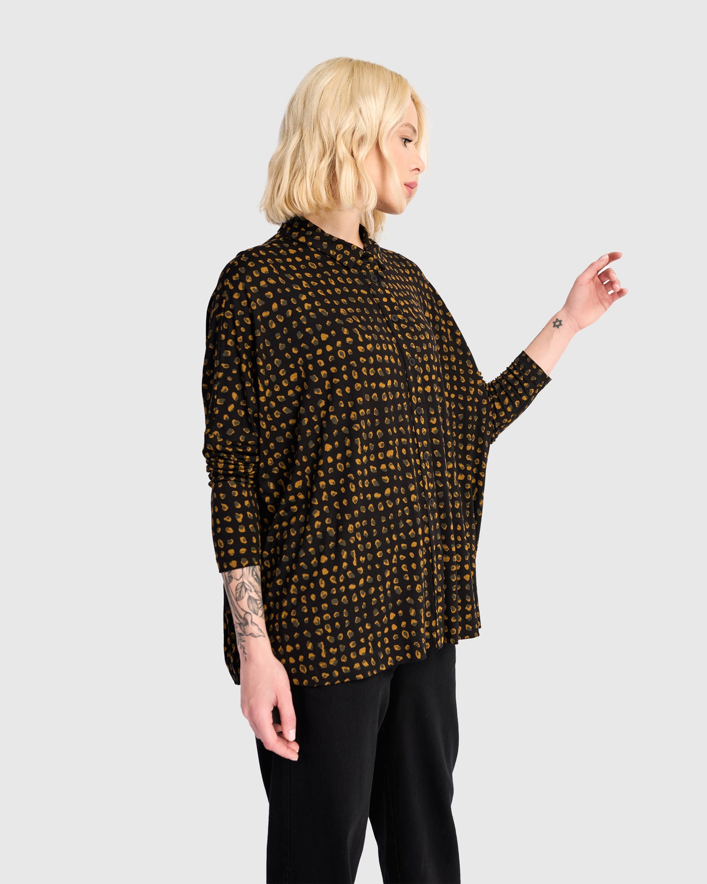 חולצה רינה פולו מנומרת