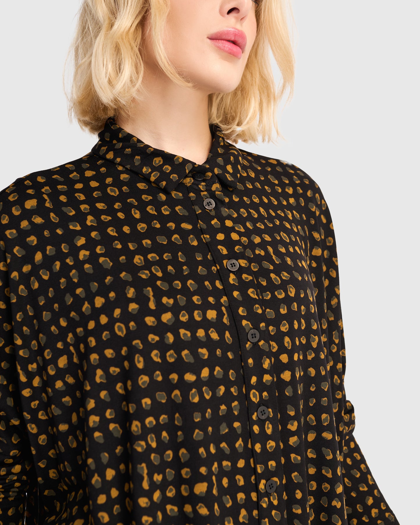 חולצה רינה פולו מנומרת