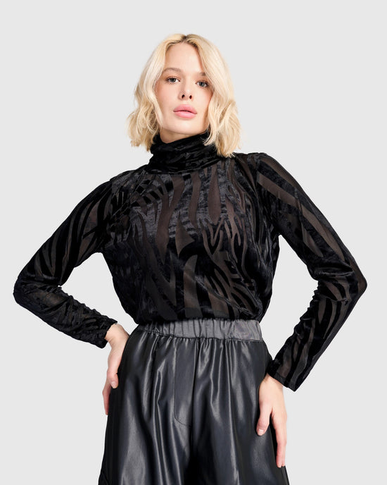 טוניקה גולף זברה פלוק