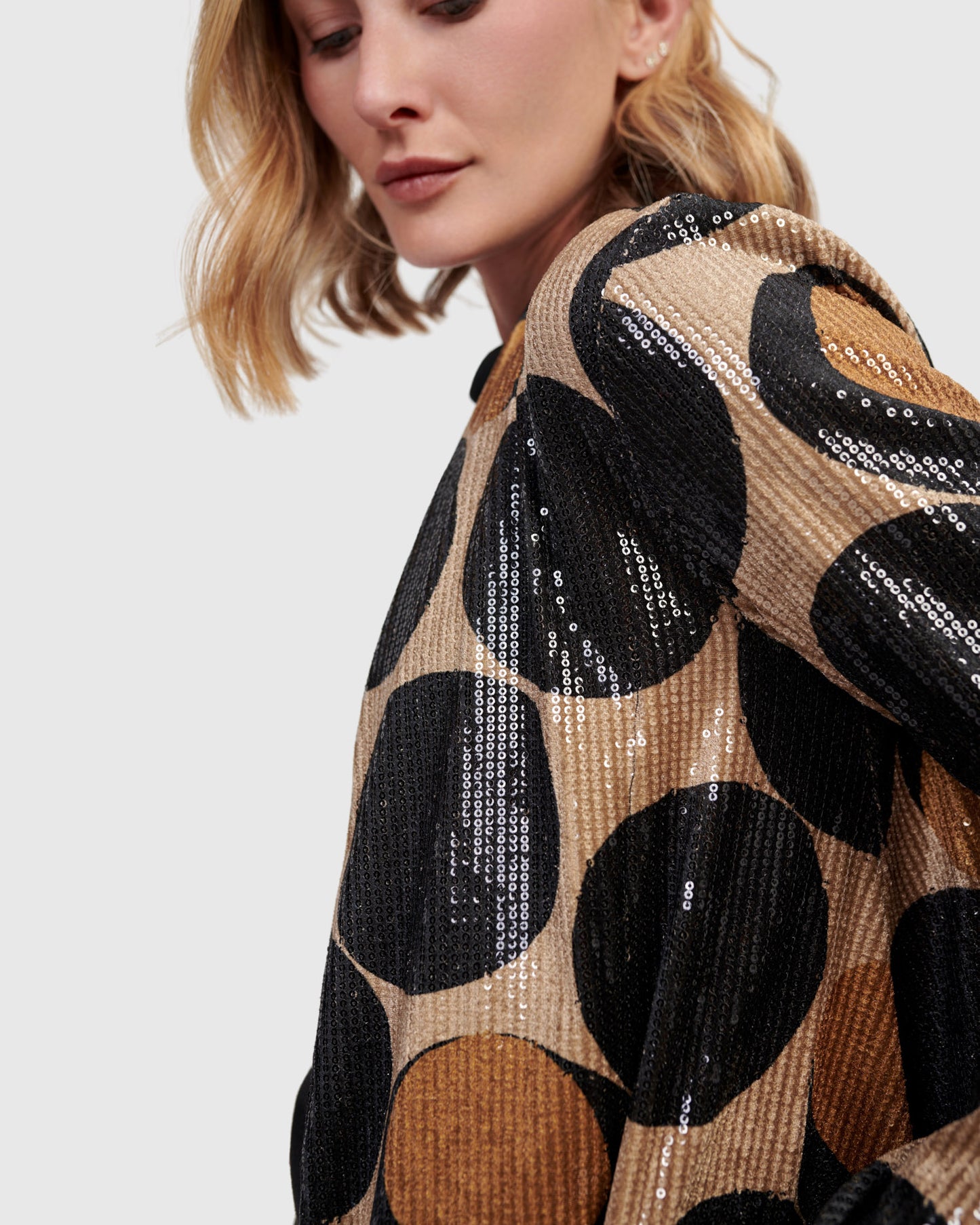 ז'קט מסתובב פאייטים עיגולים