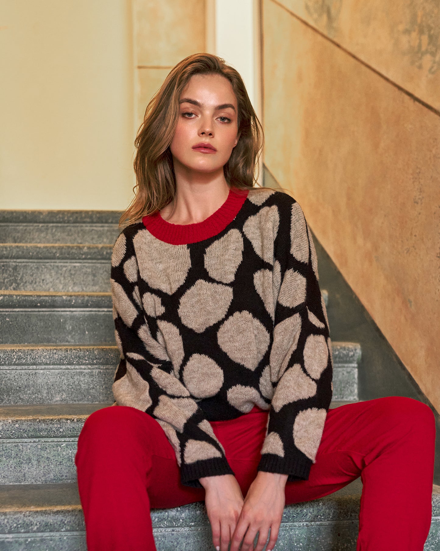 סוודר האבנים המתגלגלות