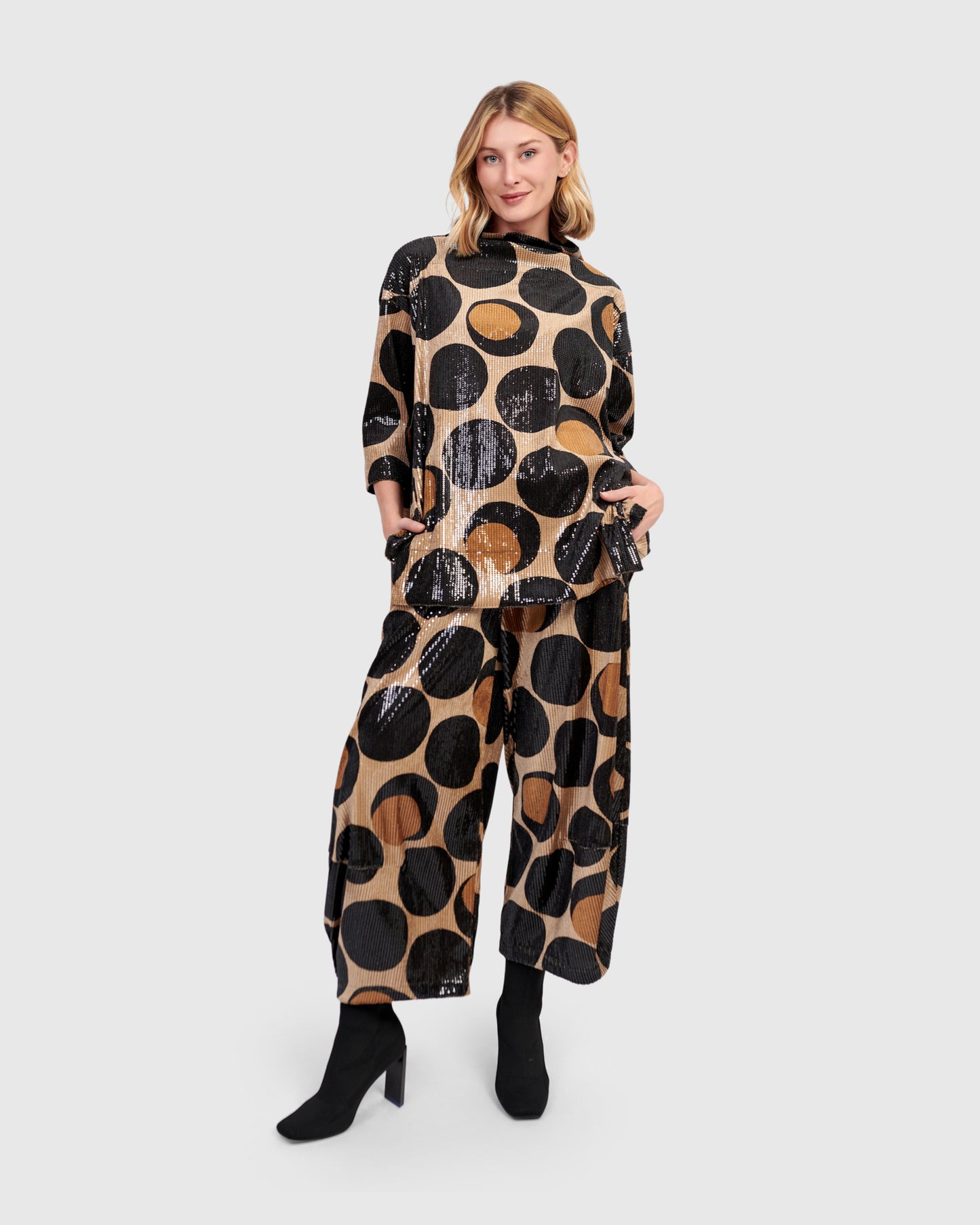 טוניקה פורצת פאייטים עיגולים