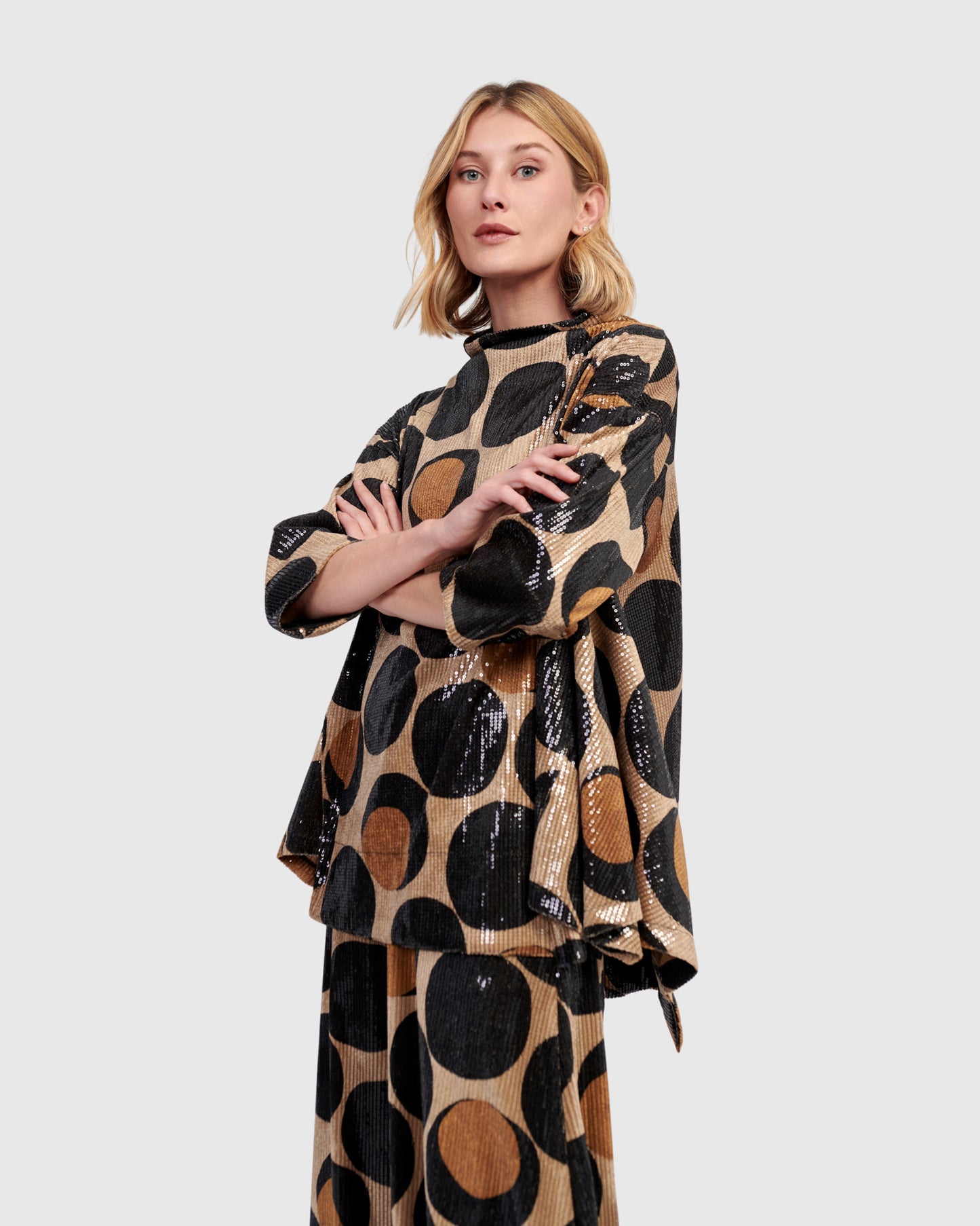 טוניקה פורצת פאייטים עיגולים