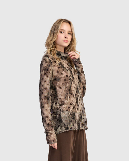 טוניקה גולף נקודות