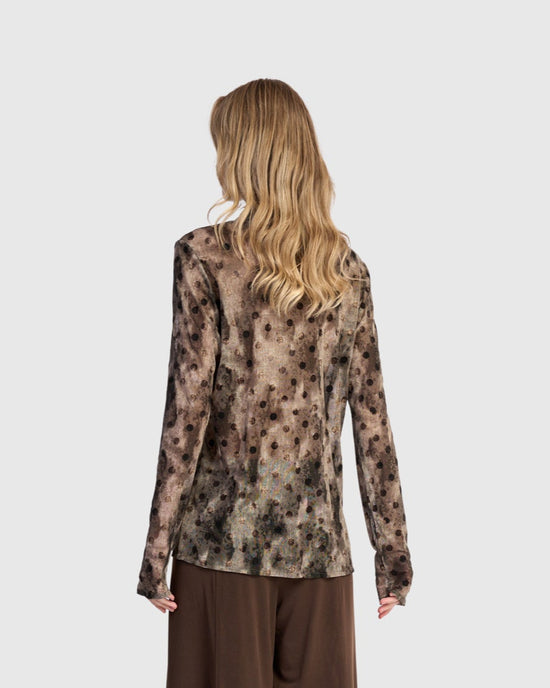 טוניקה גולף נקודות