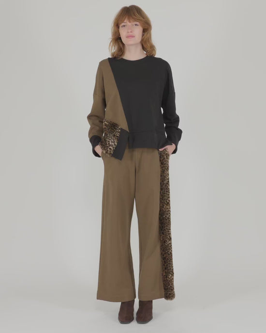 להעלות ולנגן וידיאו לגלריית צפיה, מכנסי אורבן בסטי פרווה כאמל
