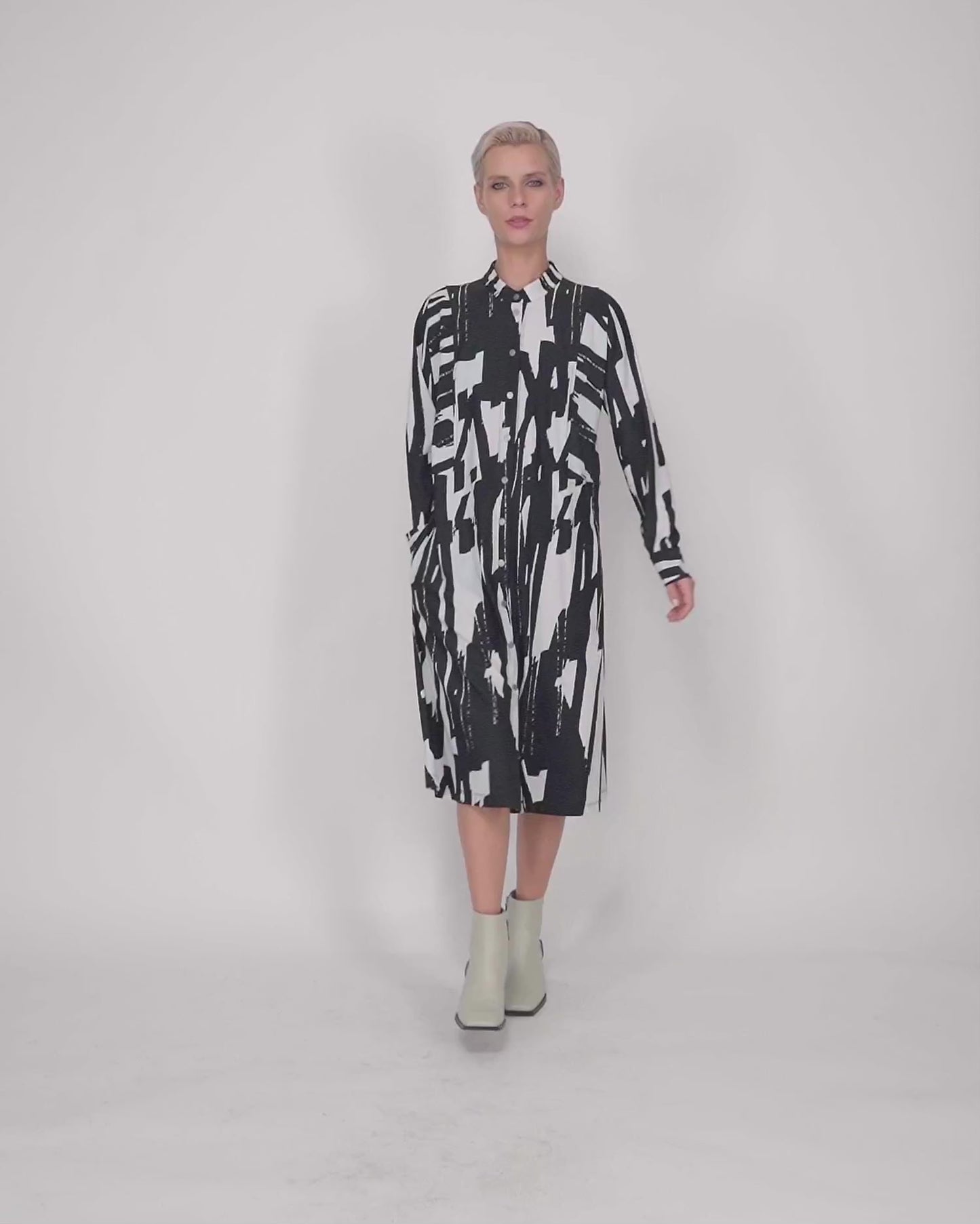 להעלות ולנגן וידיאו לגלריית צפיה, שמלה הפי שחור לבן
